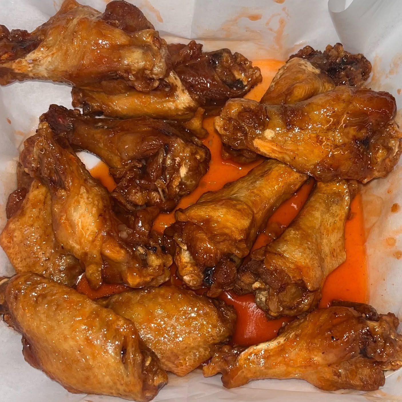 Fresh jumbo buffalo wings tossed in sauce at Spectators Bar & Grille, Pottstown PA